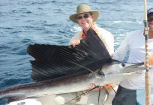 Man holding sailfish